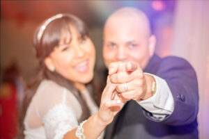 Wedding photography of the bride and groom dancing at the wedding reception captured in Tampa, FL